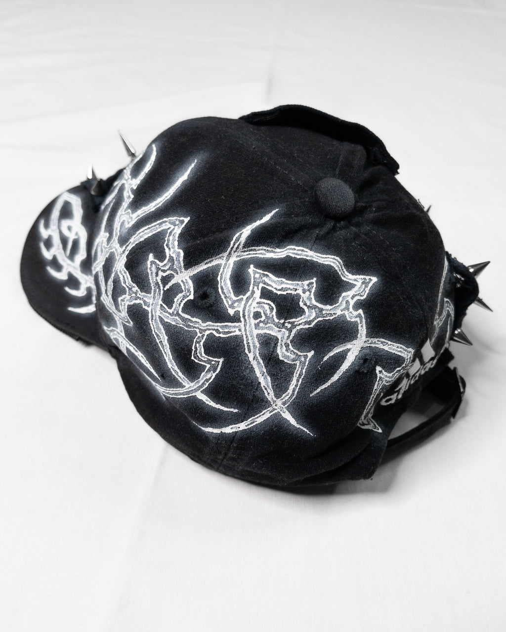 "sharp" cap