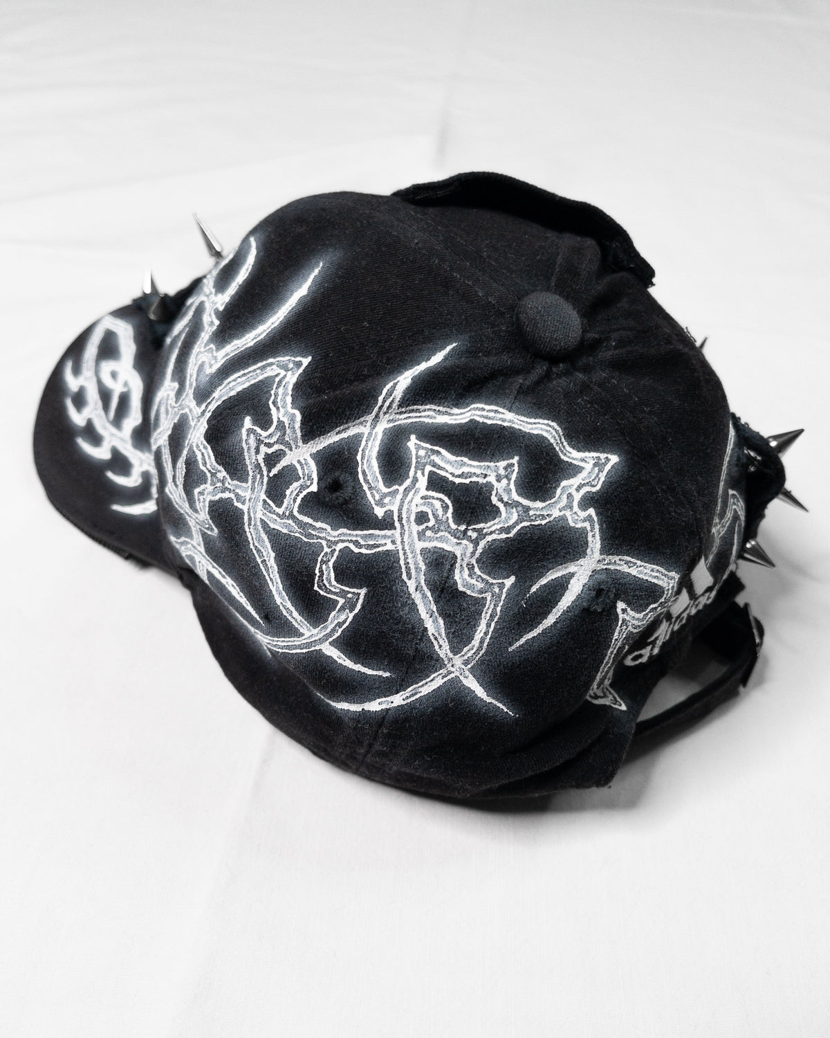 "sharp" cap