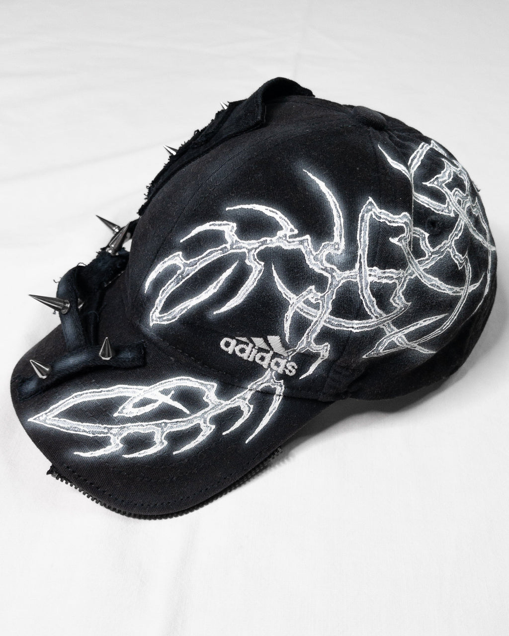 "sharp" cap