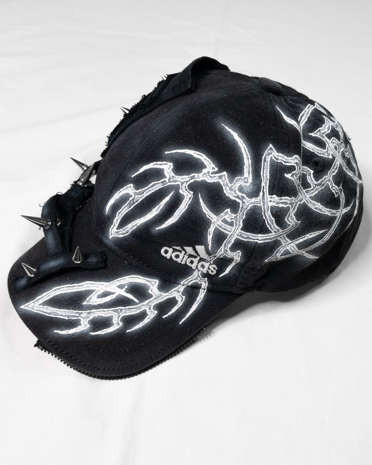 "sharp" cap