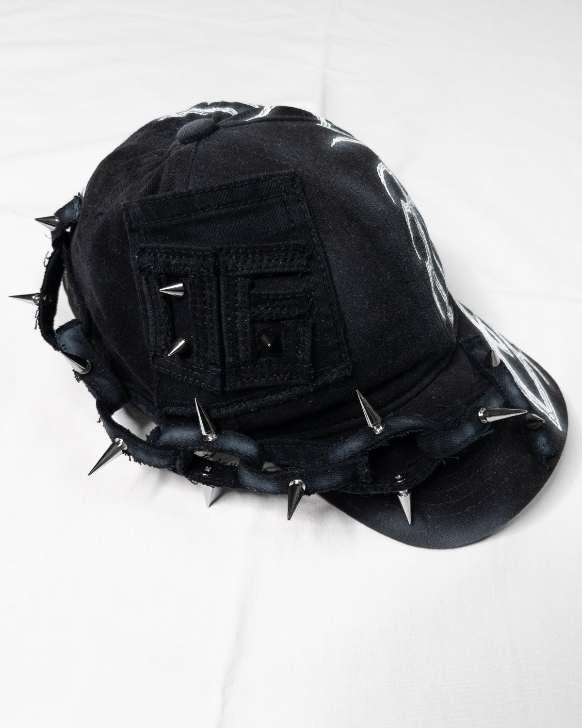 "sharp" cap